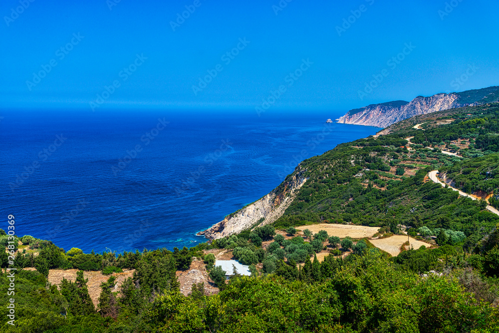 mediterranean shore with blue see and cloudless sky