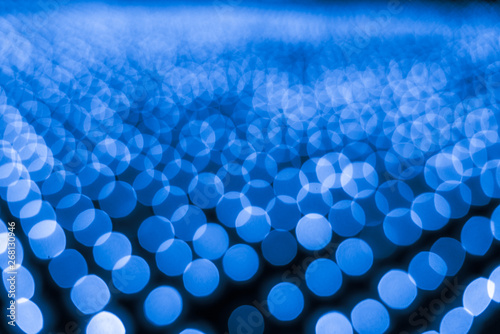Abstract bokeh background. Soft defocused lights. Neon basic blue color
