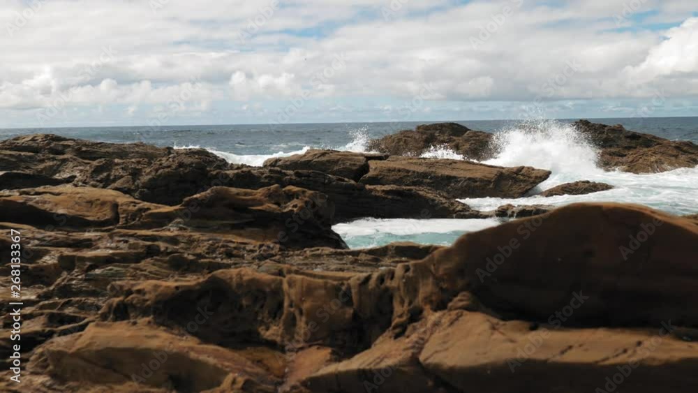 Waves hitting rocks slow-motion Australia Waves hitting rocks slow-motion Australia