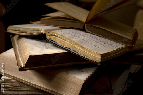 old books and handwritten diary photo