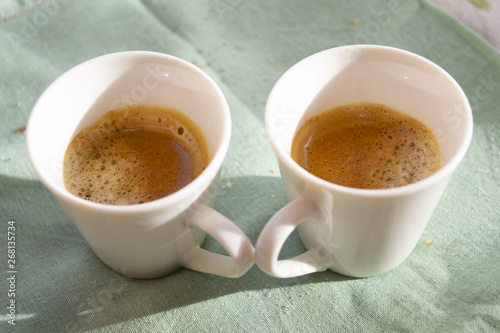 double small cups of extra strong espresso