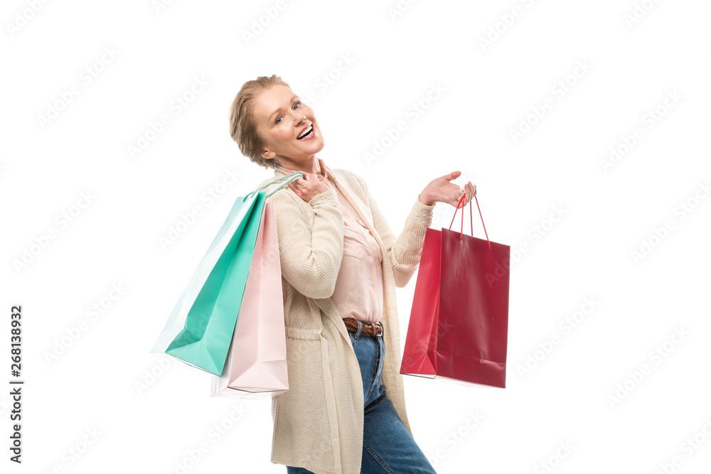 happy middle aged woman with shopping bags Isolated On White happy middle aged woman with shopping bags Isolated On White