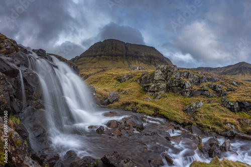 Wild Faroe Islands Landscape with Waterfall