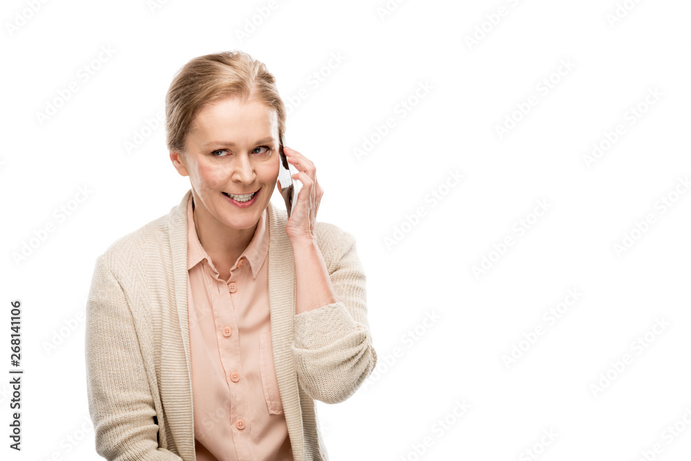 middle aged woman talking on smartphone Isolated On White with copy space middle aged woman talking on smartphone Isolated On White with copy space