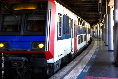Modern metro station with high speed subway train in Paris, France. Railway transportation. Travel background.