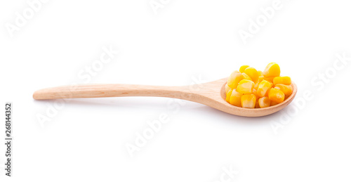 sweet corn in the wooden spoon an isolated on white background