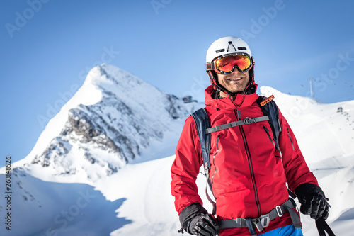 Portrait of a happy male freeride skier in the alps