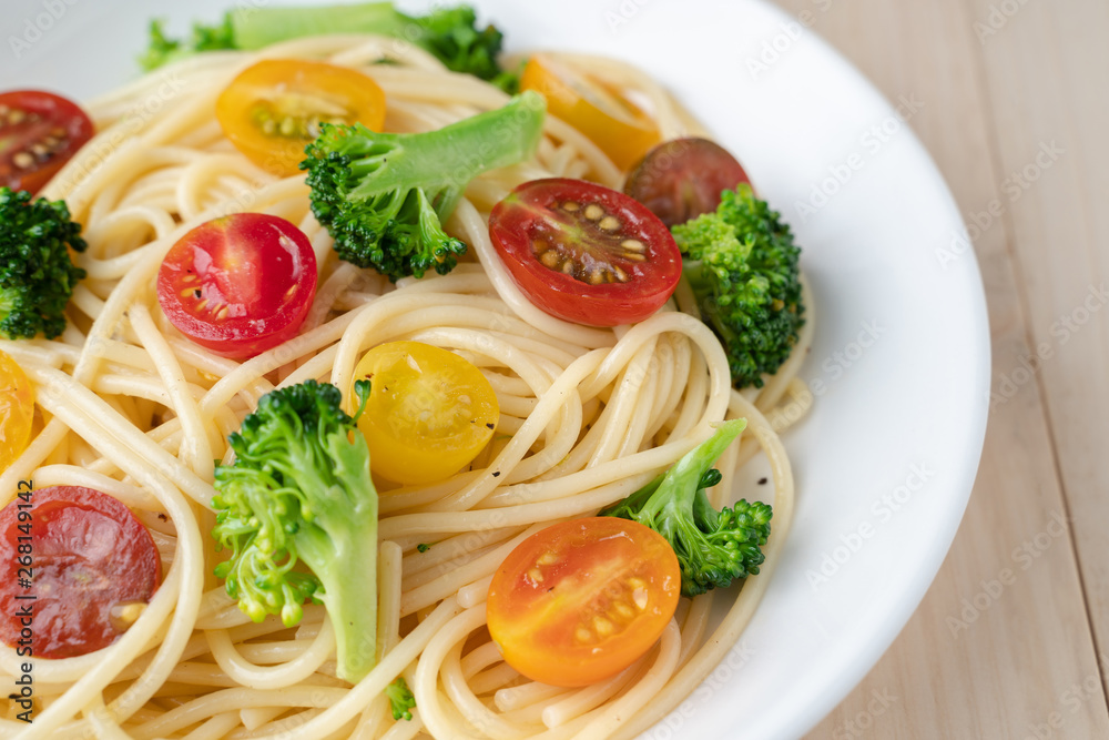 Vegetables spaghetti with tomato and broccoli, healthy vegetarian meals concept Vegetables spaghetti with tomato and broccoli, healthy vegetarian meals concept