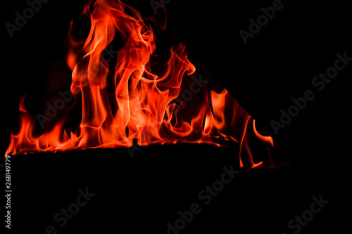 Blazing red flames on a black background