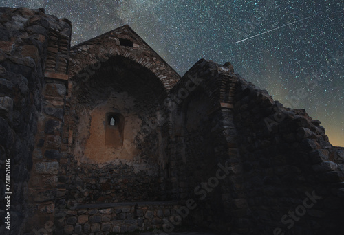 Old ruins church at the starry night photo