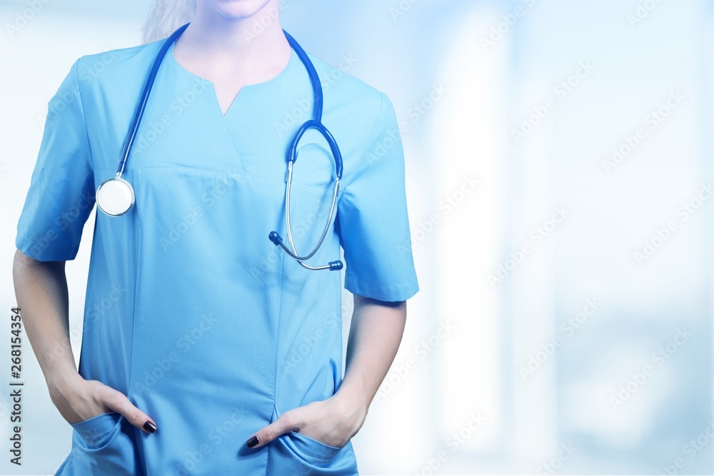 Young man doctor holding stethoscope Young man doctor holding stethoscope