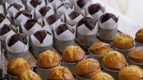 Freshly baked muffins in bakery. Top view.