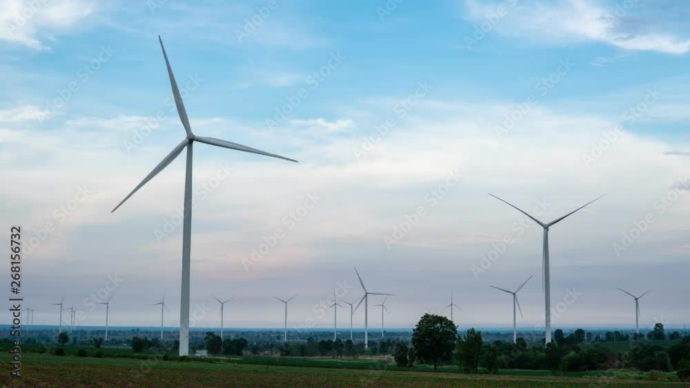 Timelapse 4k-Aerial view of Wind turbines of save Energy save world in video 4k format. aerial shot on sunset. drone footage turbines at sunrise with beautiful clouds Timelapse 4k-Aerial view of Wind turbines of save Energy save world in video 4k format. aerial shot on sunset. drone footage turbines at sunrise with beautiful clouds