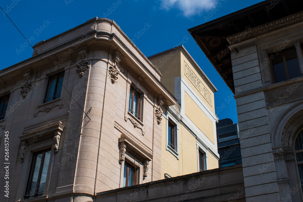Milan, Italy, 03/28/2018: skyline of the city with the historic sign of Corriere della Sera, the most important Italian daily newspaper, founded in 1876, seen from via Solferino (Solferino Street) Milan, Italy, 03/28/2018: skyline of the city with the historic sign of Corriere della Sera, the most important Italian daily newspaper, founded in 1876, seen from via Solferino (Solferino Street)