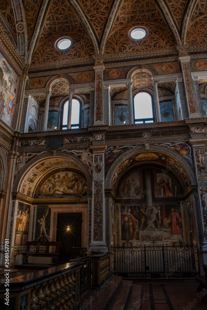 Italy, 03/28/2019: the interior of San Maurizio al Monastero Maggiore, 1518 church known as the Sistine Chapel of Milan, details of the chapels in the faithful's area with frescoes by Aurelio Luini