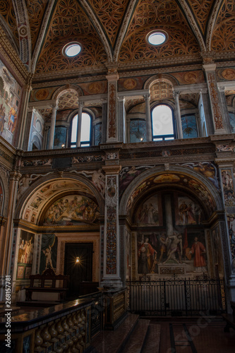 Italy, 03/28/2019: the interior of San Maurizio al Monastero Maggiore, 1518 church known as the Sistine Chapel of Milan, details of the chapels in the faithful's area with frescoes by Aurelio Luini