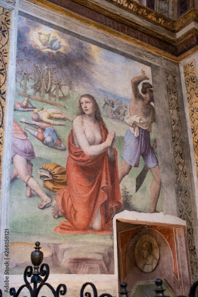 Fototapeta Italy, 03/28/2019: the interior of San Maurizio al Monastero Maggiore, 1518 church known as the Sistine Chapel of Milan, details of the chapels in the faithful's area with frescoes by Aurelio Luini