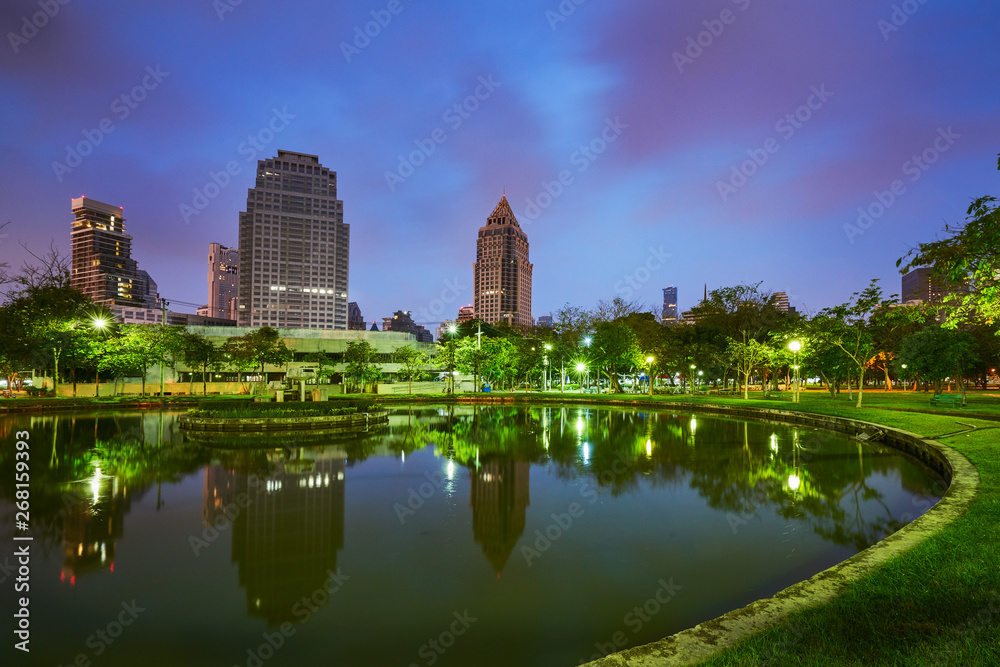 public park in early morning civil skyline landscape with cityscape building