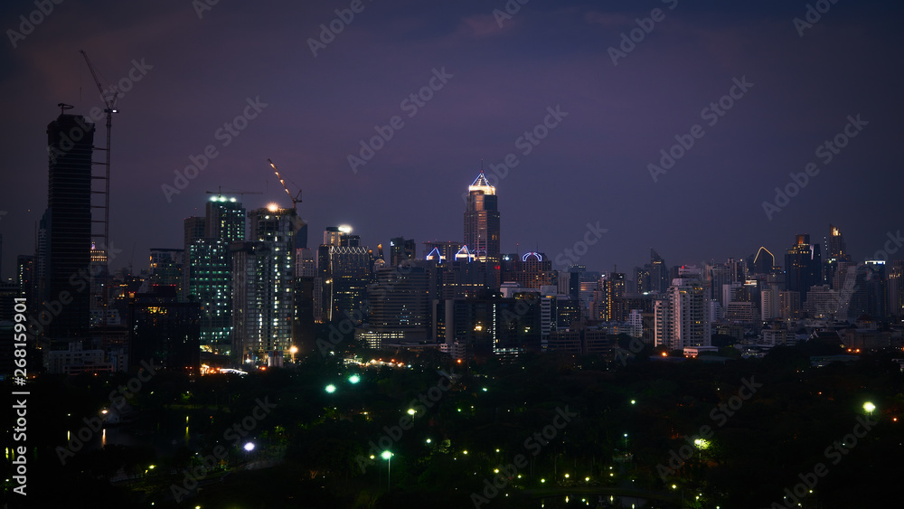 night cityscape with capital center buildings in bangkok