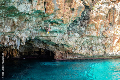 Wallpaper Mural Beautiful ocean place in Mallorca, Spain. Cliffs and ocean. Deep water solo. Cala barques. Climber on the rock. Torontodigital.ca