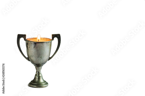 trophy with a flame isolated on white