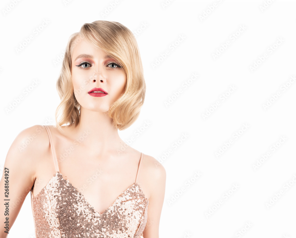 Cute smiling blonde girl with big beautiful eyes, red lips and vintage  style hairstyle, wearing a golden sparkling dress. Isolated on white.  Clean, healthy skin. Stock Photo | Adobe Stock