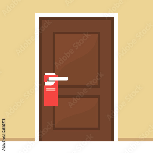 Hotel door with do not disturb sign