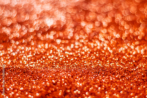 Glitter light abstract red orange bokeh blurred background