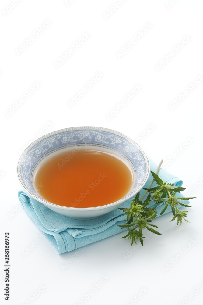 Field eryngo infusion in bowl (Eryngium campestre) Field eryngo infusion in bowl (Eryngium campestre)