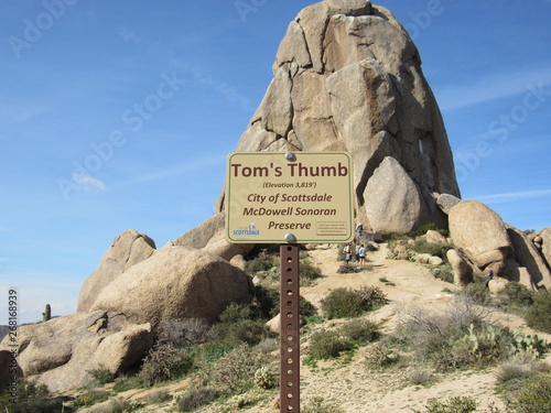 View of Tom's Thumb with an information sign in the Sonoran McDowell Mountain range 