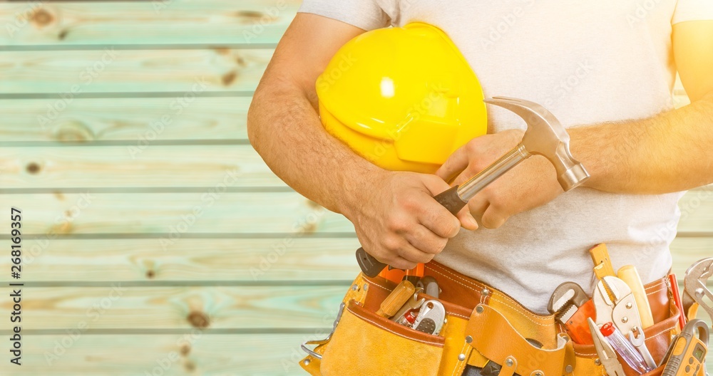 Worker with a tool belt. Isolated over background. Worker with a tool belt. Isolated over background.