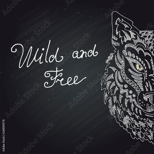 Wild beautiful wolf head hand draw on a chalk board background. Fashion in a vector illustration photo