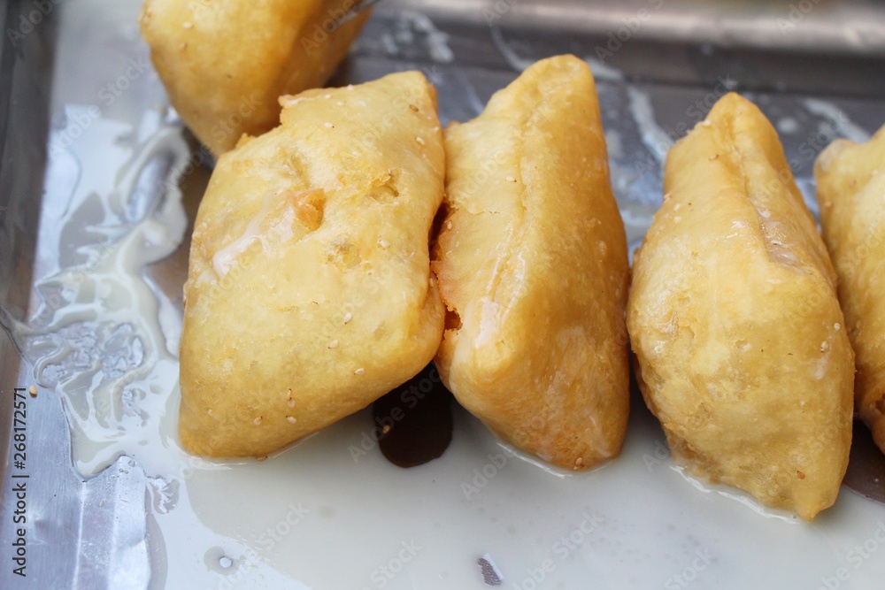 Deep fried dough put sweet condensed milk Deep fried dough put sweet condensed milk