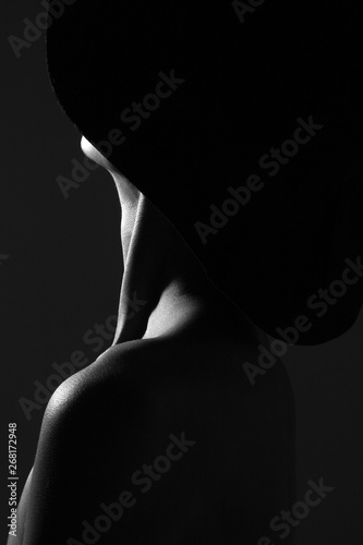 Silhouette of woman with beautiful neck.