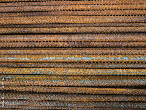 A large number of fittings. Rusty iron rods for construction. Strengthening of concrete structures