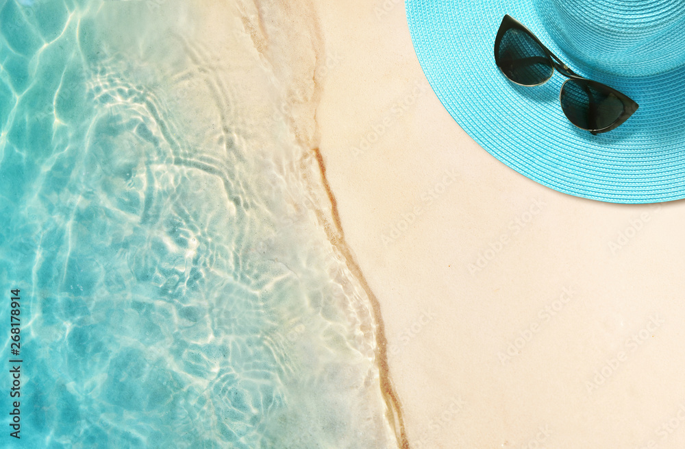 Hat and sunglasses on the sandy beach. Summer background Stock Photo ...