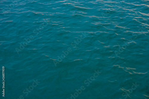 beautiful texture of sea water with shallow wave, top view. thick blue-turquoise color. © Pavel