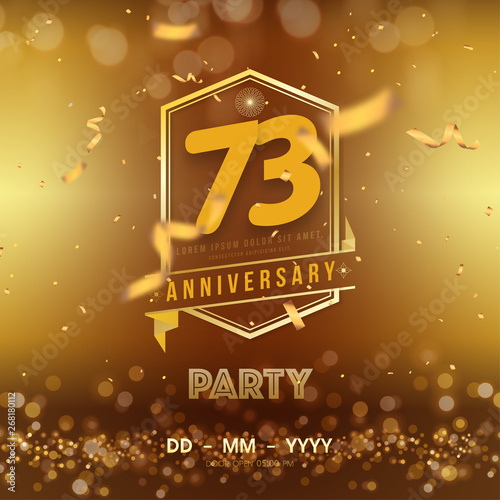 73 years anniversary logo template on gold background. 73rd celebrating golden numbers with ribbon and confetti isolated design elements. photo