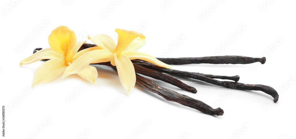 Aromatic vanilla sticks and flowers on white background Aromatic vanilla sticks and flowers on white background