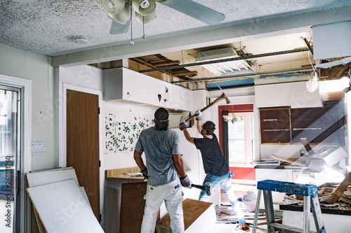Kitchen: Men Working As Sunbeams Stream Through Dust