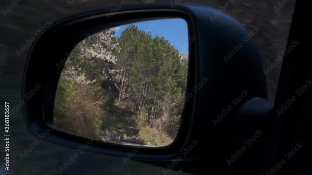 rearview mirror car mountain forest road rearview mirror car mountain forest road