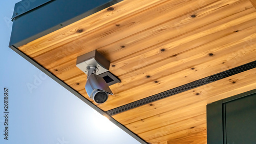 Panorama Home with security camera installed on the wooden underside of its roof