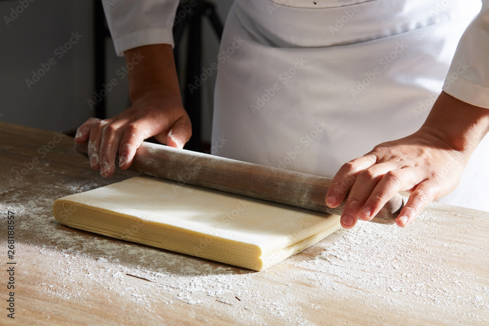 The process of making cantonese bread by hand is done in a sunshine making workshop The process of making cantonese bread by hand is done in a sunshine making workshop