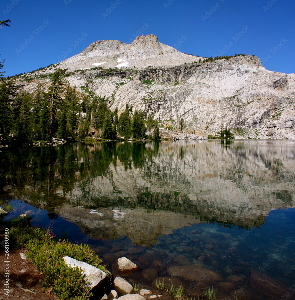 Hiking to May Lake in the High Sierra Mountains in Yosemite National Park in California Hiking to May Lake in the High Sierra Mountains in Yosemite National Park in California