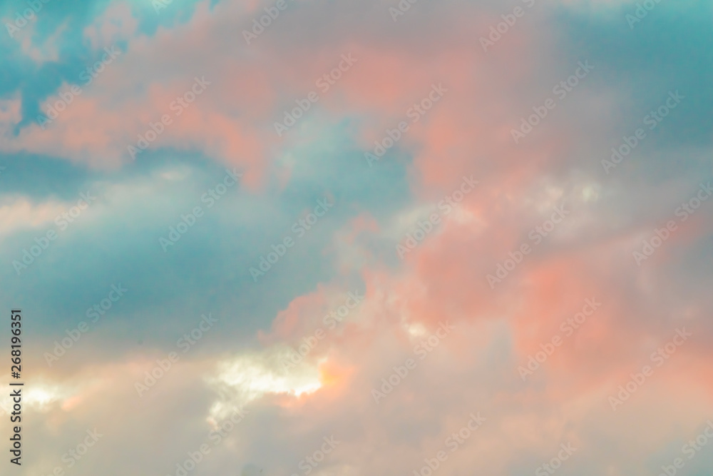 Clouds in the sky, which are beautifully illuminated by the evening sun and invite you to dream and relax.
