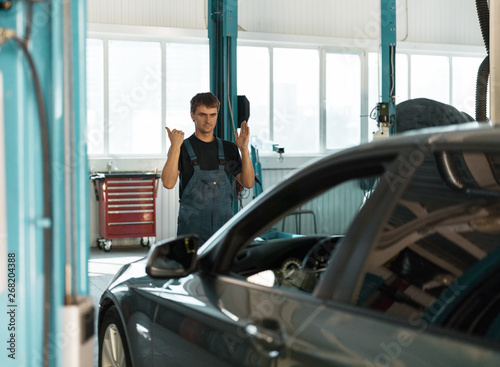 Man helping client with garage entrance photo