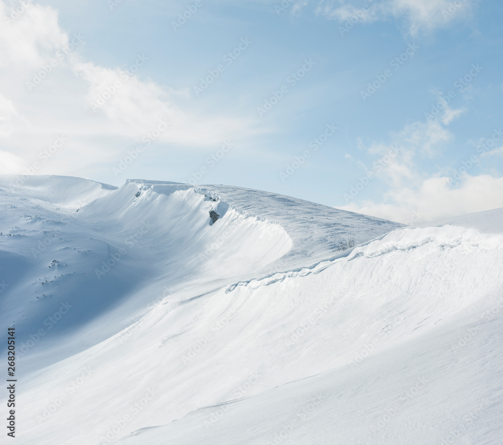 Snow covered mountain ridge Snow covered mountain ridge