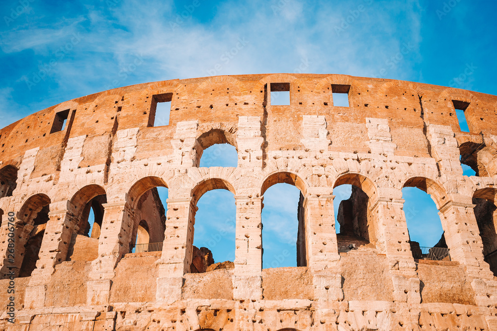 Colosseum or Coliseum background blue sky in Rome