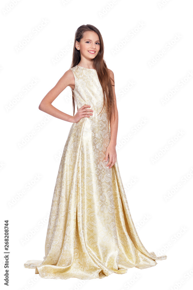 Happy little girl in carnival costume posing on white background