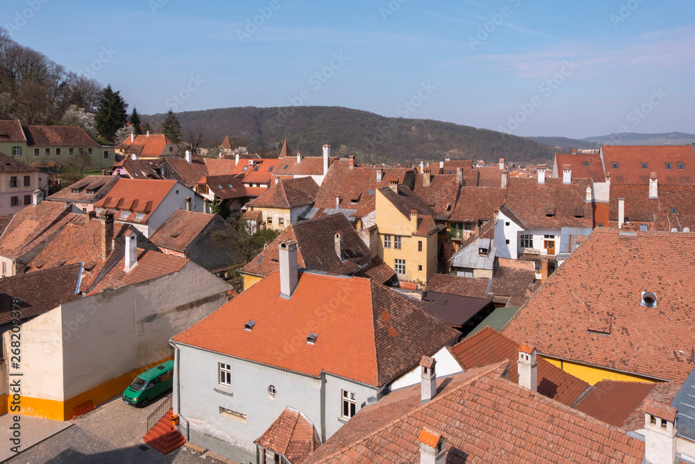 View from the Clock Tower in Sighisoara of of colorful houses in the citadel
